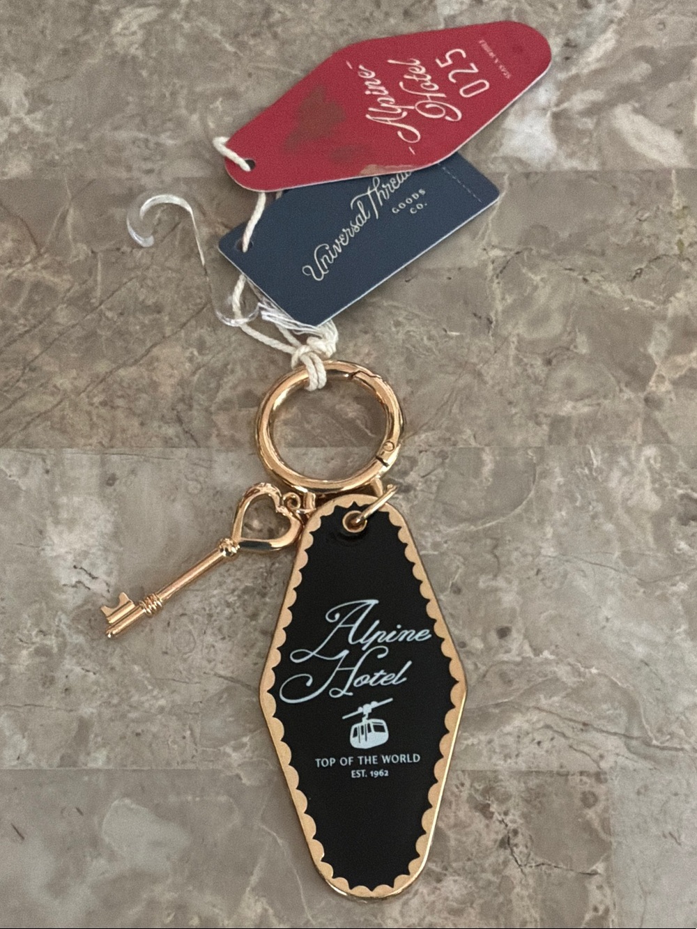 Universal Thread Black & Gold Alpine Hotel Keychain with Red Tag